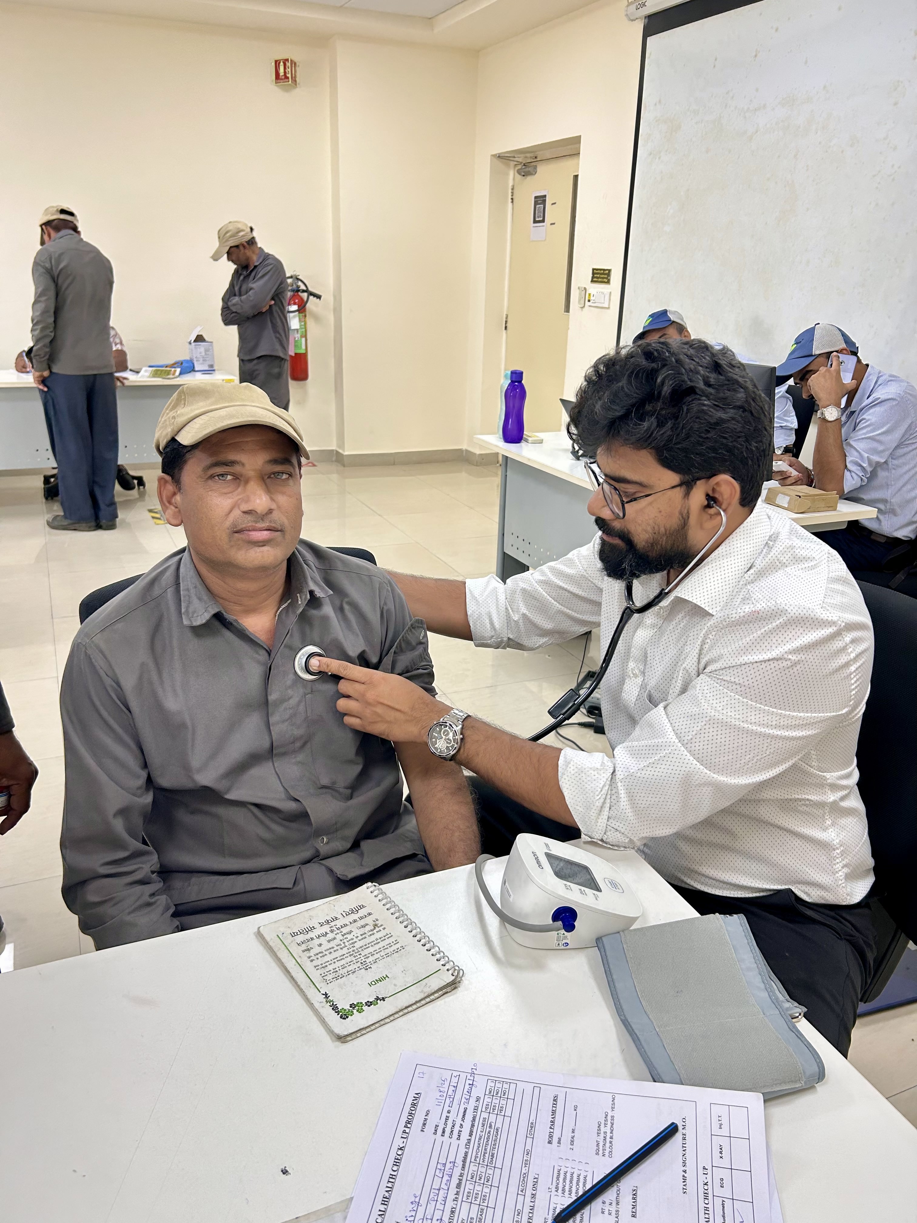 A doctor examining a patient.